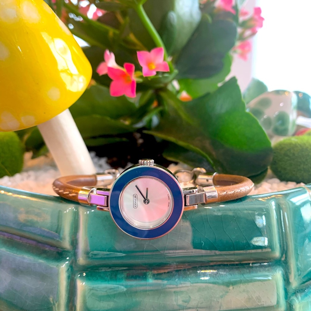 Coach watch with interchangeable bezels